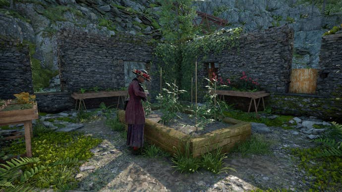 The player looks at Mother Jago as she tends to her garden in Atomfall