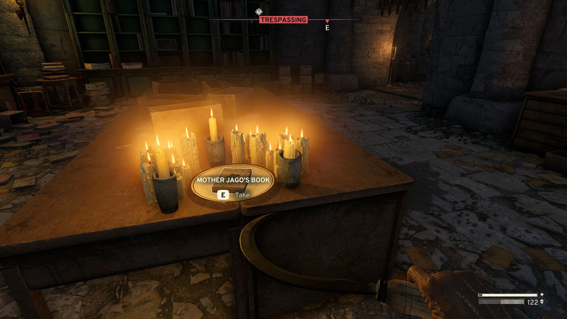 The player looks at Mother Jago's book on a table inside of the Castle Ruins in Atomfall - 1