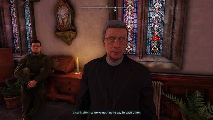 The player speaks with a rather displeased Vicar McHenry in Atomfall