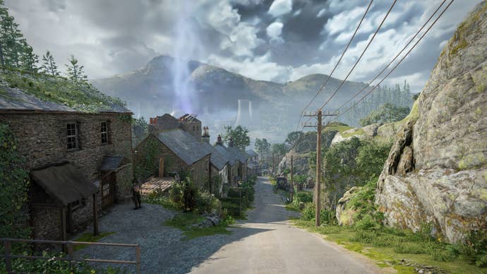 The player looks out over Wyndham Village, after approaching it from Slatten Dale, in Atomfall