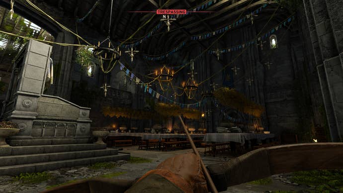 An ornately decorated castle hall in Atomfall.