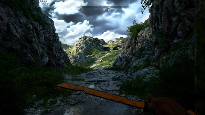 A screenshot of Atomfall running on PS5 Pro showing the moment you emerge from a bunker and see the large open green landscape ahead of you.