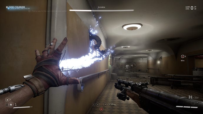 Using Shok, one of the glove abilities in Atomic Heart, to disable a camera.