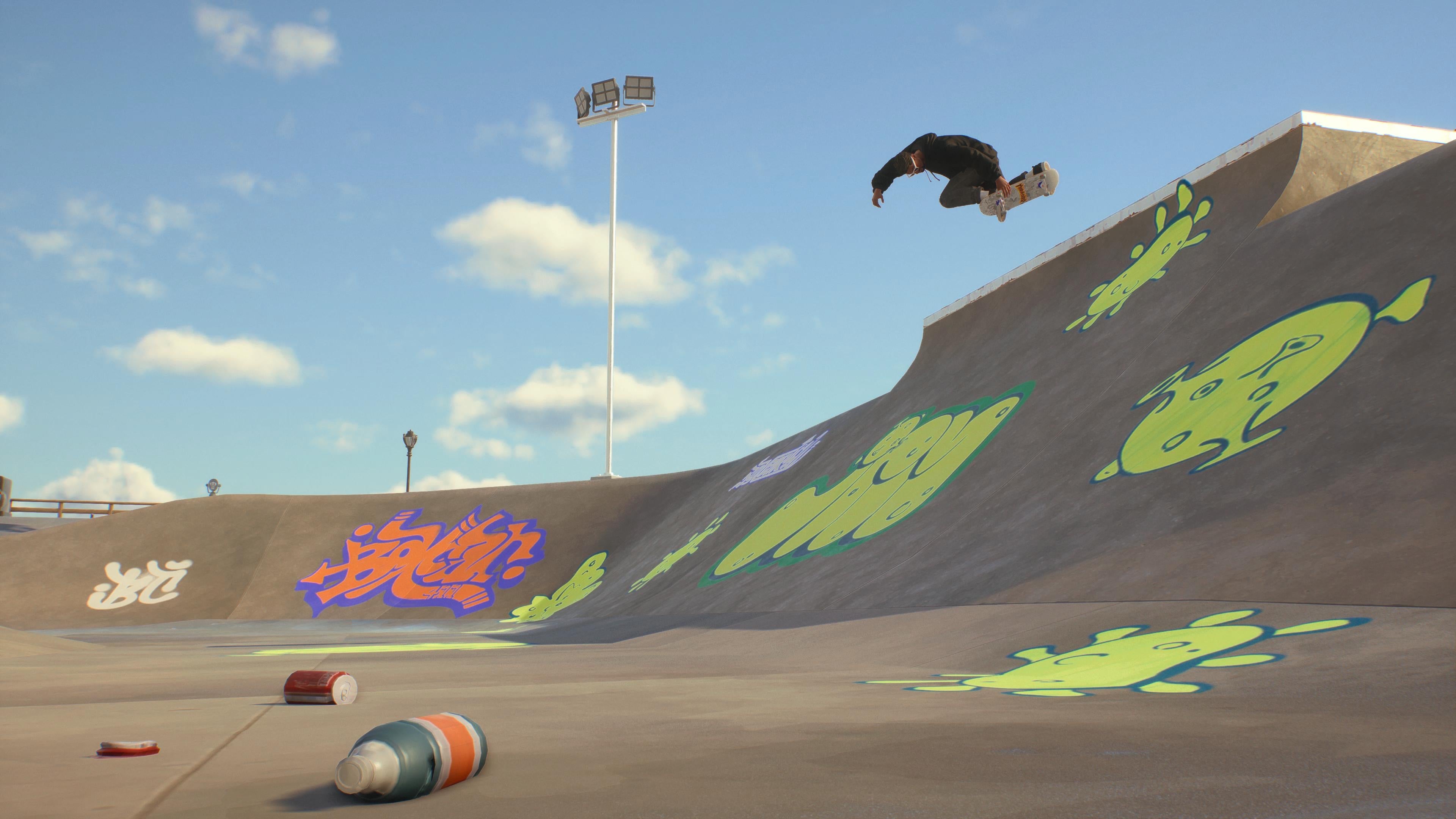 A Skate. player on a concrete ramp under blue skies, getting some backside air