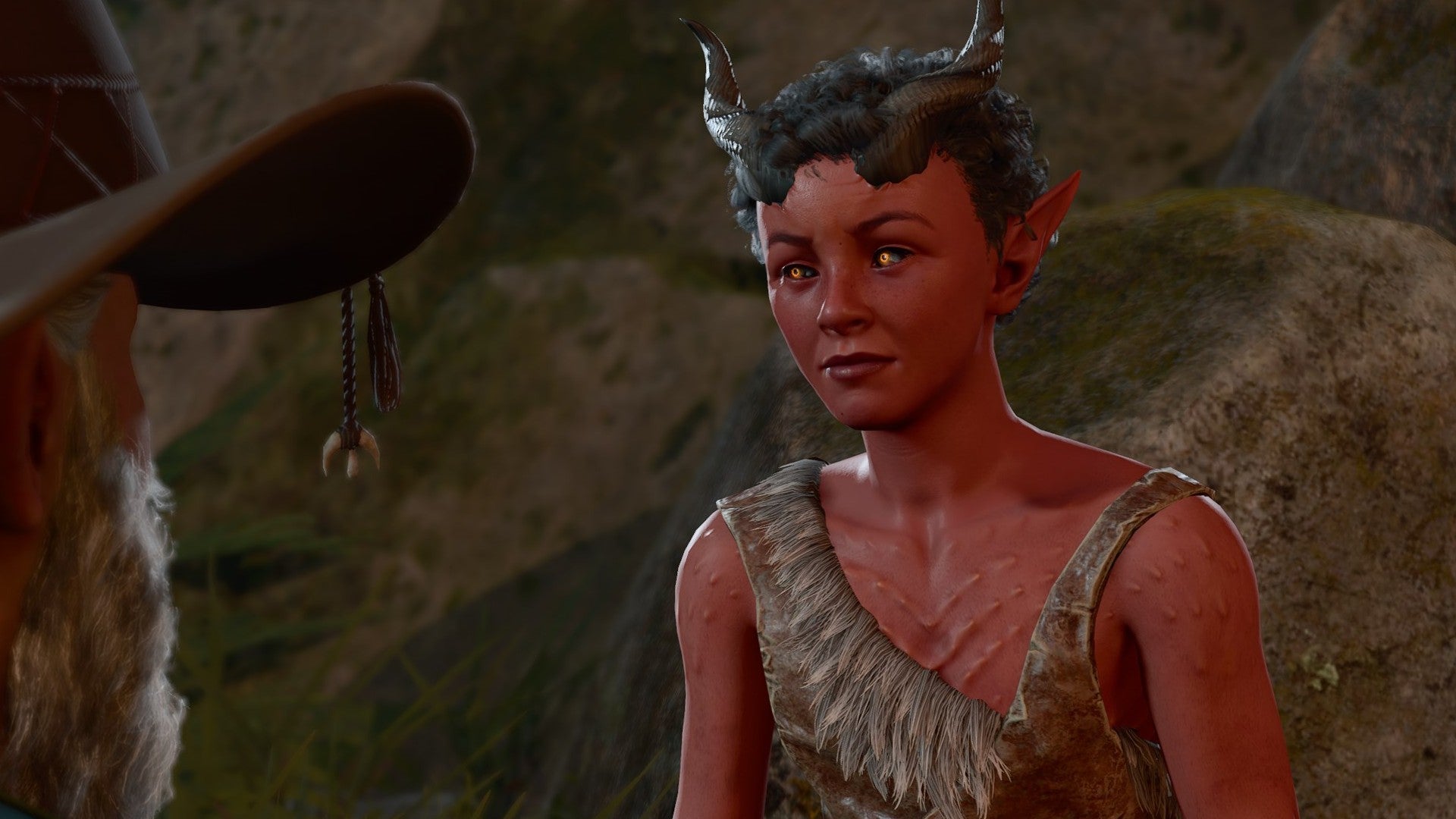 Baldur&rsquo;s Gate 3 image showing the side of a Gnome Wizard&rsquo;s face as they talk to Doni, a young Tiefling.