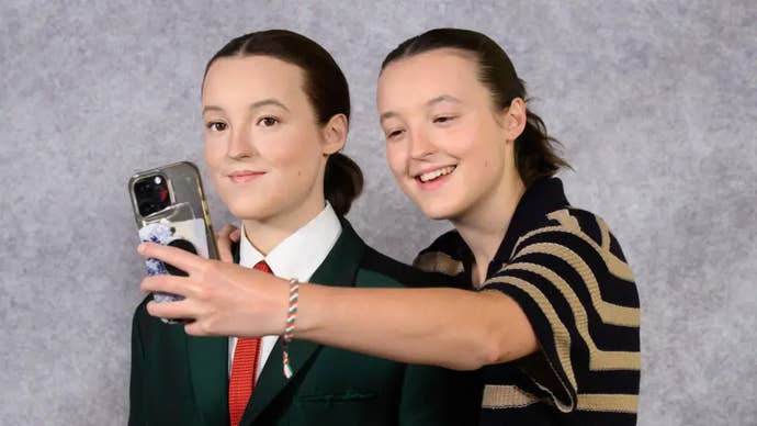 Bella Ramsey takes a selfie with their waxwork figure