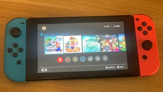 Nintendo Switch Neon Red and Blue console on home page with Super Mario Bros. Wonder, Super Mario RPG, The Legend of Zelda: Tears of the Kingdom, Mario Kart 8 Deluxe, and Animal Crossing New Horizons.