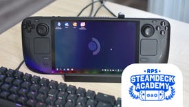 A Steam Deck, docked in a Valve Steam Deck Docking Station, with a mouse and keyboard connected to the latter. The RPS Steam Deck Academy logo is added in the bottom-right corner.