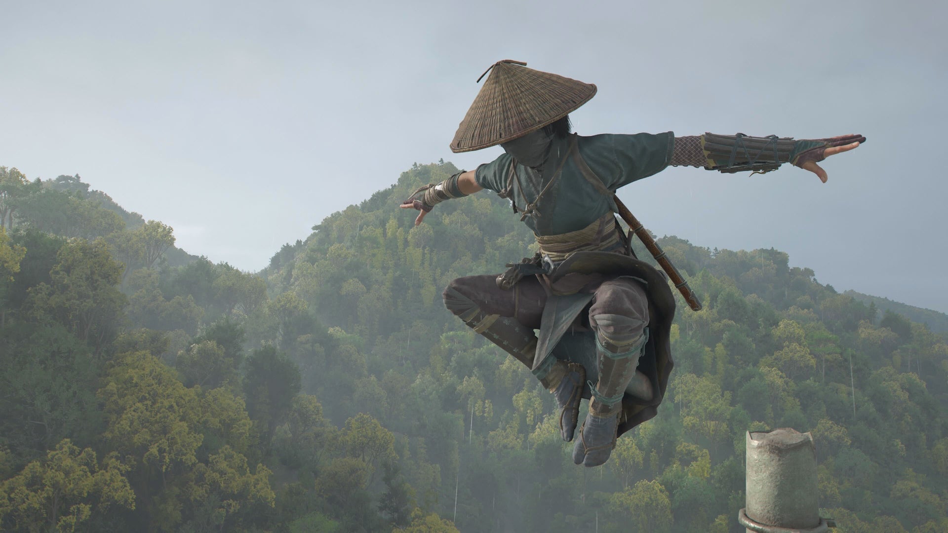 Naoe from Assassin&rsquo;s Creed Shadows jumping in the rain, with a forest and grey skies behind her.