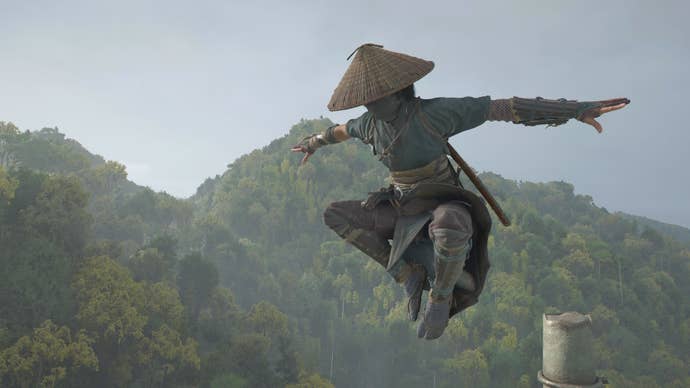 Naoe from Assassin’s Creed Shadows jumping in the rain, with a forest and grey skies behind her.