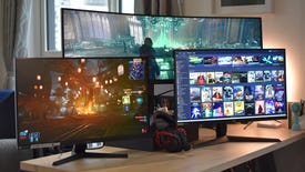 Three of the best gaming monitors arranged on a desk.
