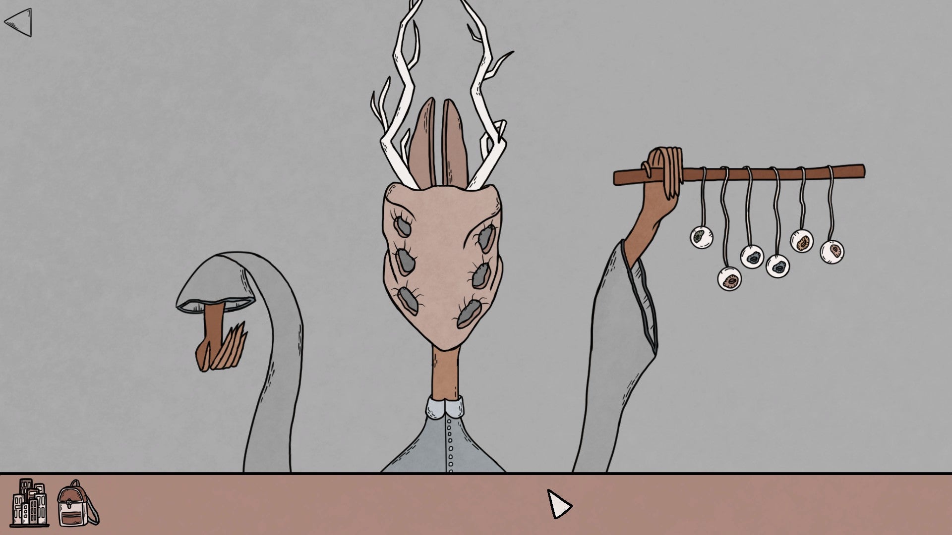 A strange horned being in Birth holds up a stick with eyeballs hanging off it.