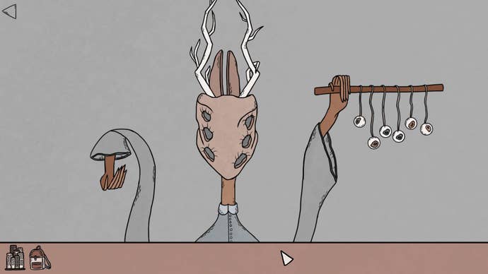 A strange horned being in Birth holds up a stick with eyeballs hanging off it.