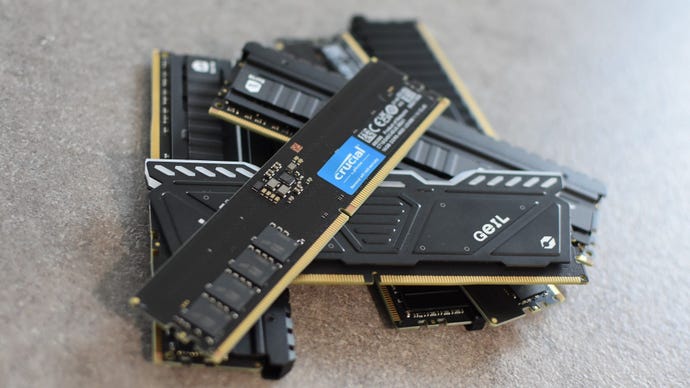 A stack of assorted DDR4 and DDR5 RAM.