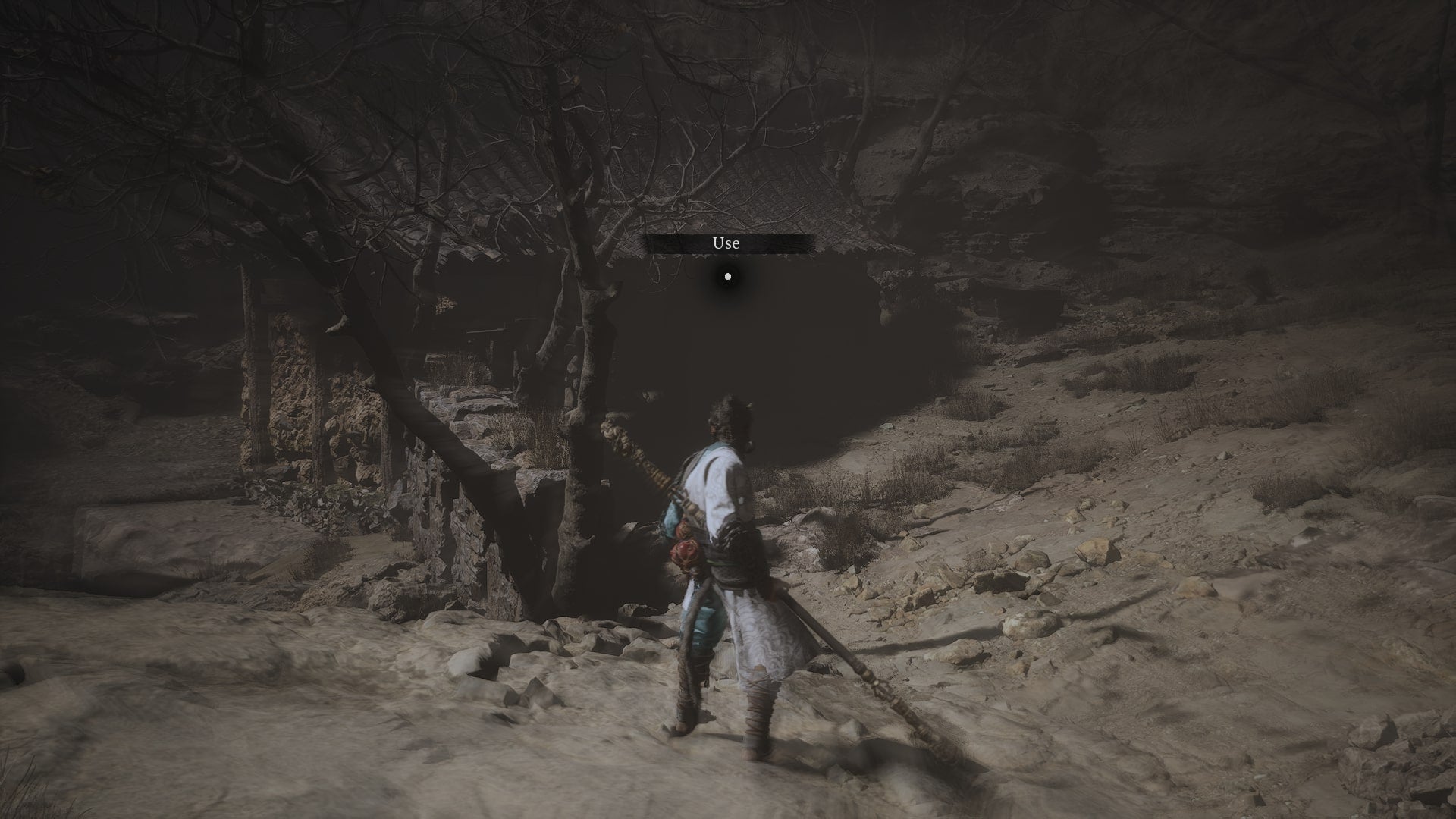 The player uses the Old Rattle Drum at the Valley of Despair in Black Myth Wukong - 6