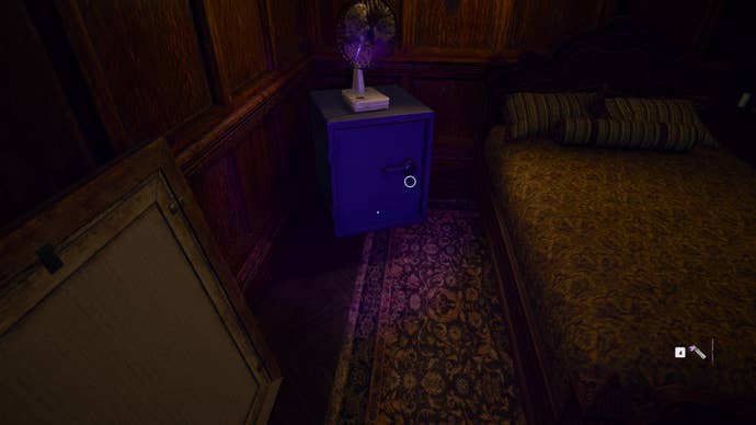 The player looks at the safehouse’s safe, found in one of the bedrooms, in Call of Duty: Black Ops 6