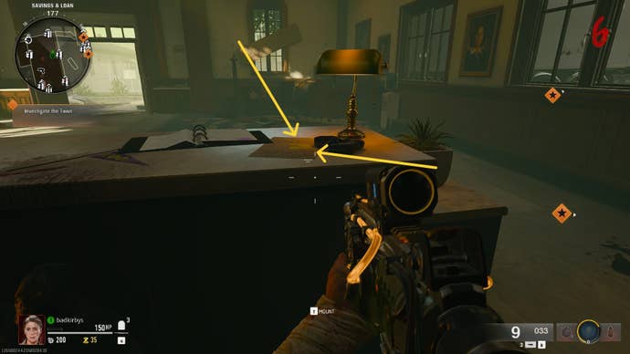 Two yellow arrows point to a post-it note on the front desk of Liberty Falls bank in Black Ops 6 Zombies