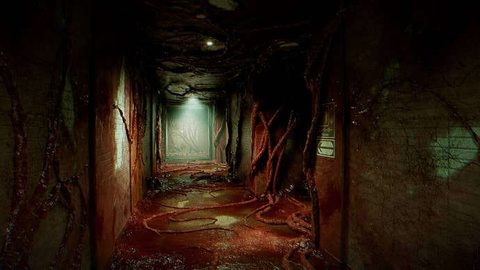 A corridor covered in blood and flesh-like appendages is shown in BrokenLore: Don’t Watch