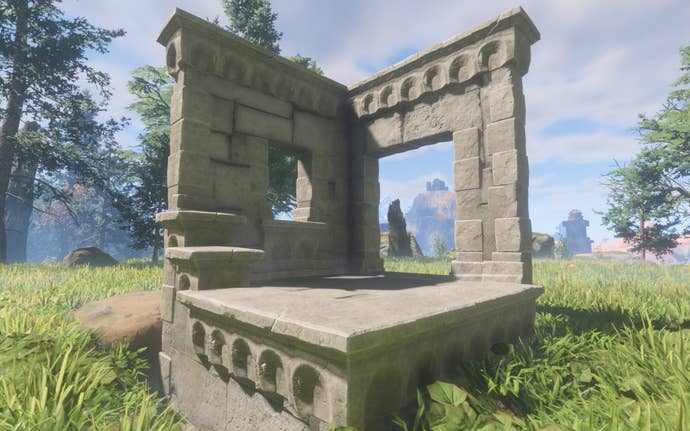 A demonstration of the Refined Stone Block, made of fairly even grey stone bricks, with some fancy carvings above the doors and windows.