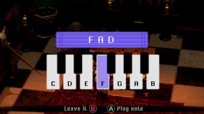 En la pantalla hay un teclado estilizado que muestra las letras CDEFGA B. FAD se muestra encima del teclado.