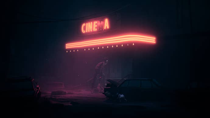 A Reanimal screenshot showing two children hiding behind the wreckage of a car as a gangly limbed man drags a body into a derelict cinema, whose neon red sign shines through the darkness.