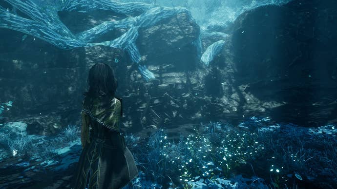 Lune looks towards some crates in Spring Meadows, where Resin can be found in Clair Obscur: Expedition 33