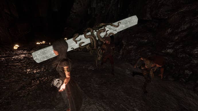 Lune can be seen with her back turned to a Rocher inside of Tide Caverns in Clair Obscur: Expedition 33