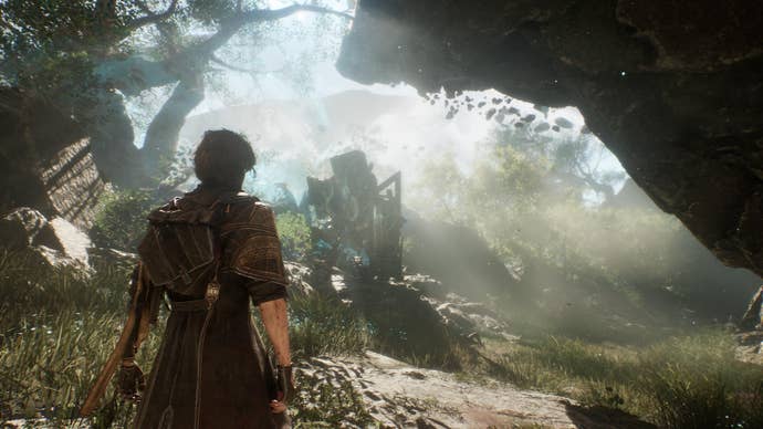 Clair Obscur: Expedition 33 screenshot showing male character exploring a sun-dappled verdant forest