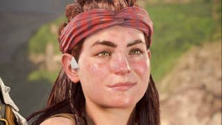 Close up of Aloy from PlayStation's Horizon games. She has a red cloth wrapped around her forehead