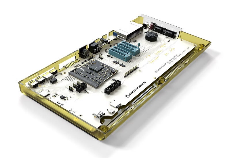 A Commodore 64 Ultimate with its top shell and keyboard removed, revealing the internal components.