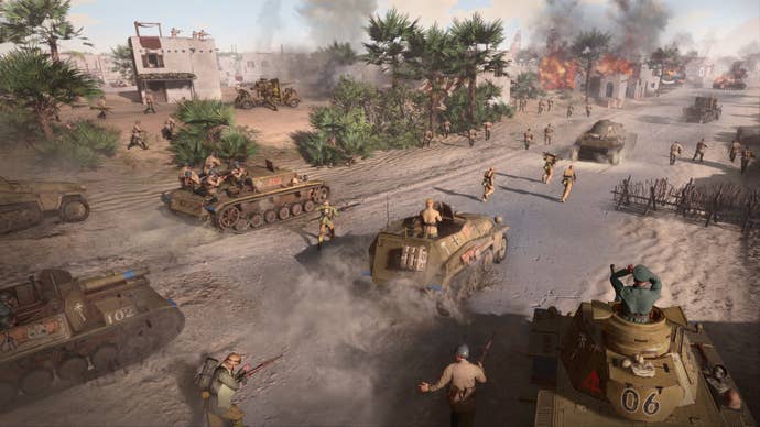Company of Heroes 3 image showing the Wehrmacht forces pushing down a road with tanks and infantry.