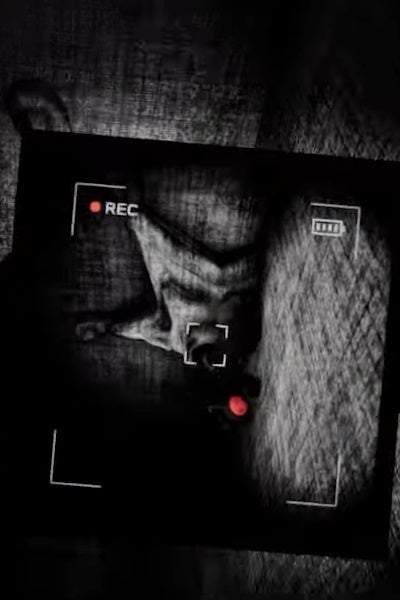 Filiming a Slurper monster on the ceiling, with a player in their grasp, in Content Warning.