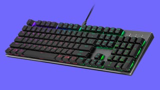 The Cooler Master SK652 gaming keyboard against a plain blue background.