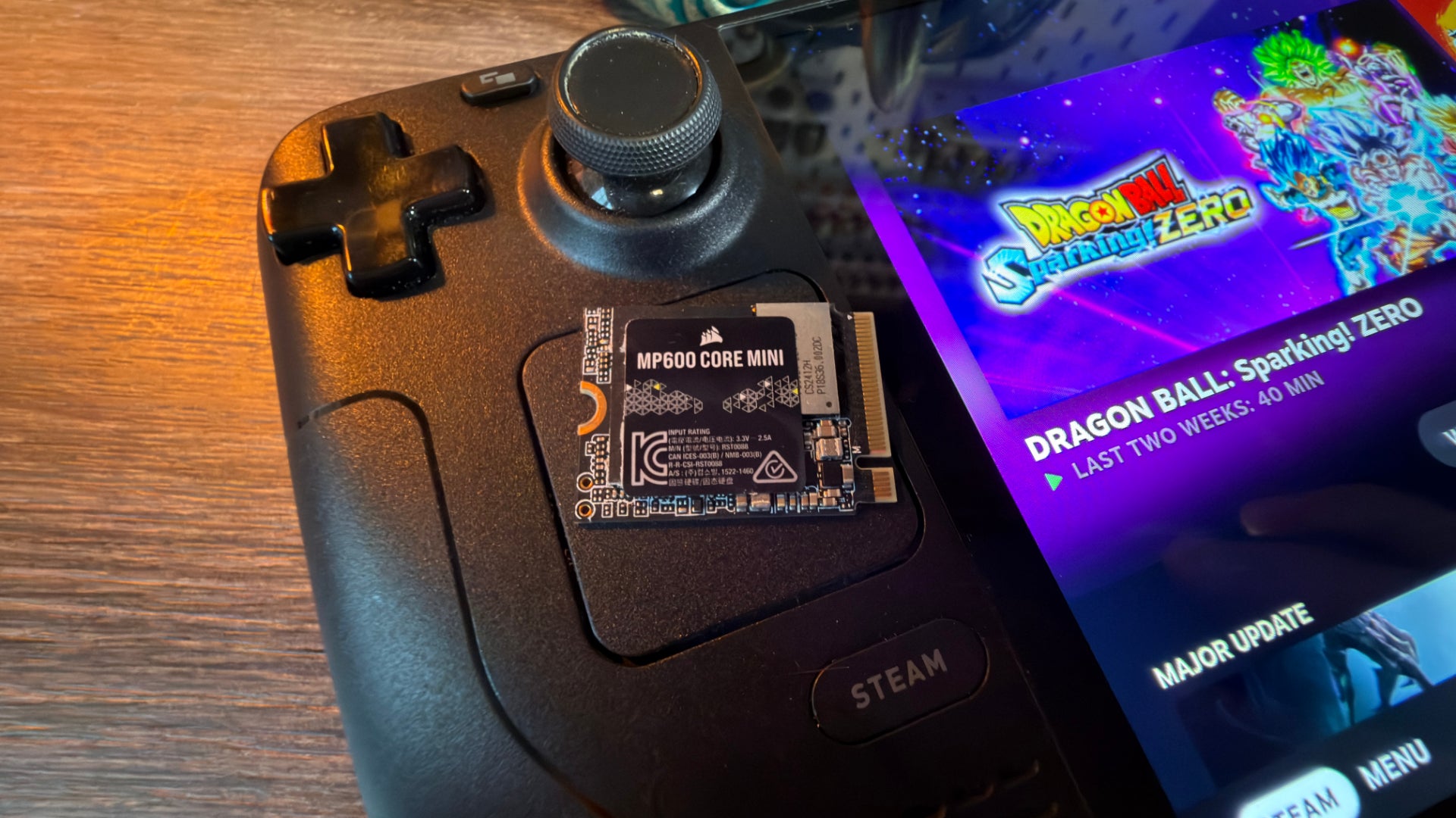 The Corsair MP600 Core Mini SSD, sat on top of a Steam Deck.
