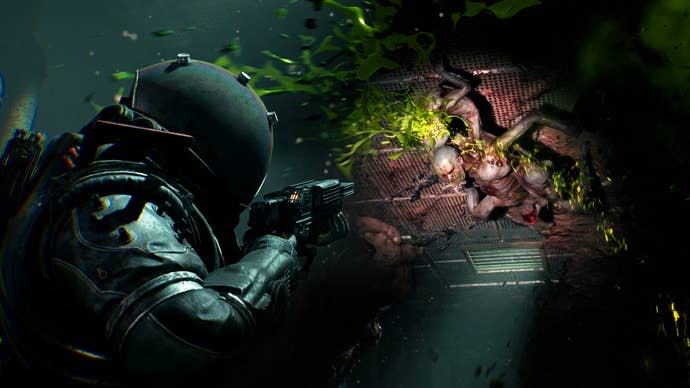 Cronos: The New Dawn screenshot showing strange character in sci-fi suit shooting a grotesque human on the ceiling spitting acid