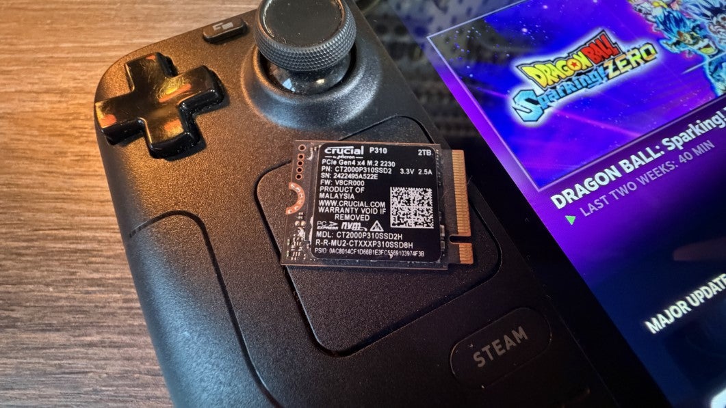 The Crucial P310 SSD, sat on top of a Steam Deck.