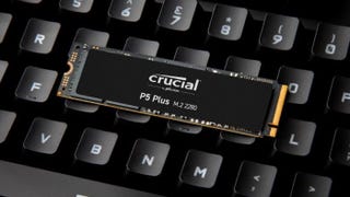 The Crucial P5 Plus SSD on top of a keyboard.