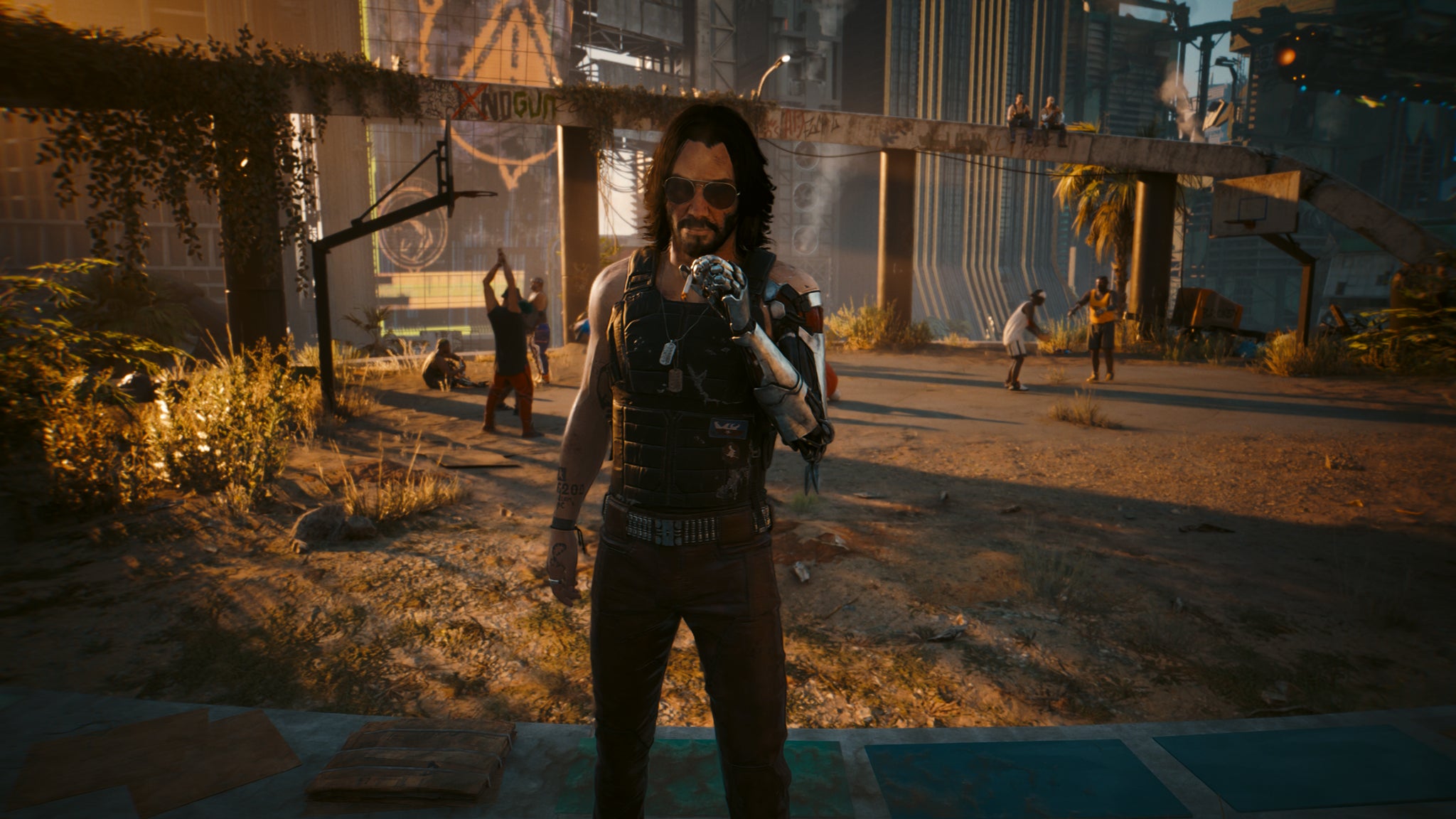 Johnny Silverhand angrily smokes in front of a basketball court in Cyberpunk 2077: Phantom Liberty. - 4