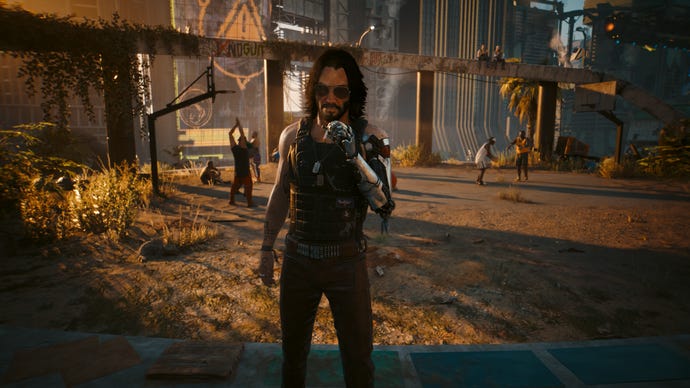Johnny Silverhand angrily smokes in front of a basketball court in Cyberpunk 2077: Phantom Liberty.