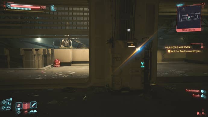 first person view of looking at a yellow restricted data terminal