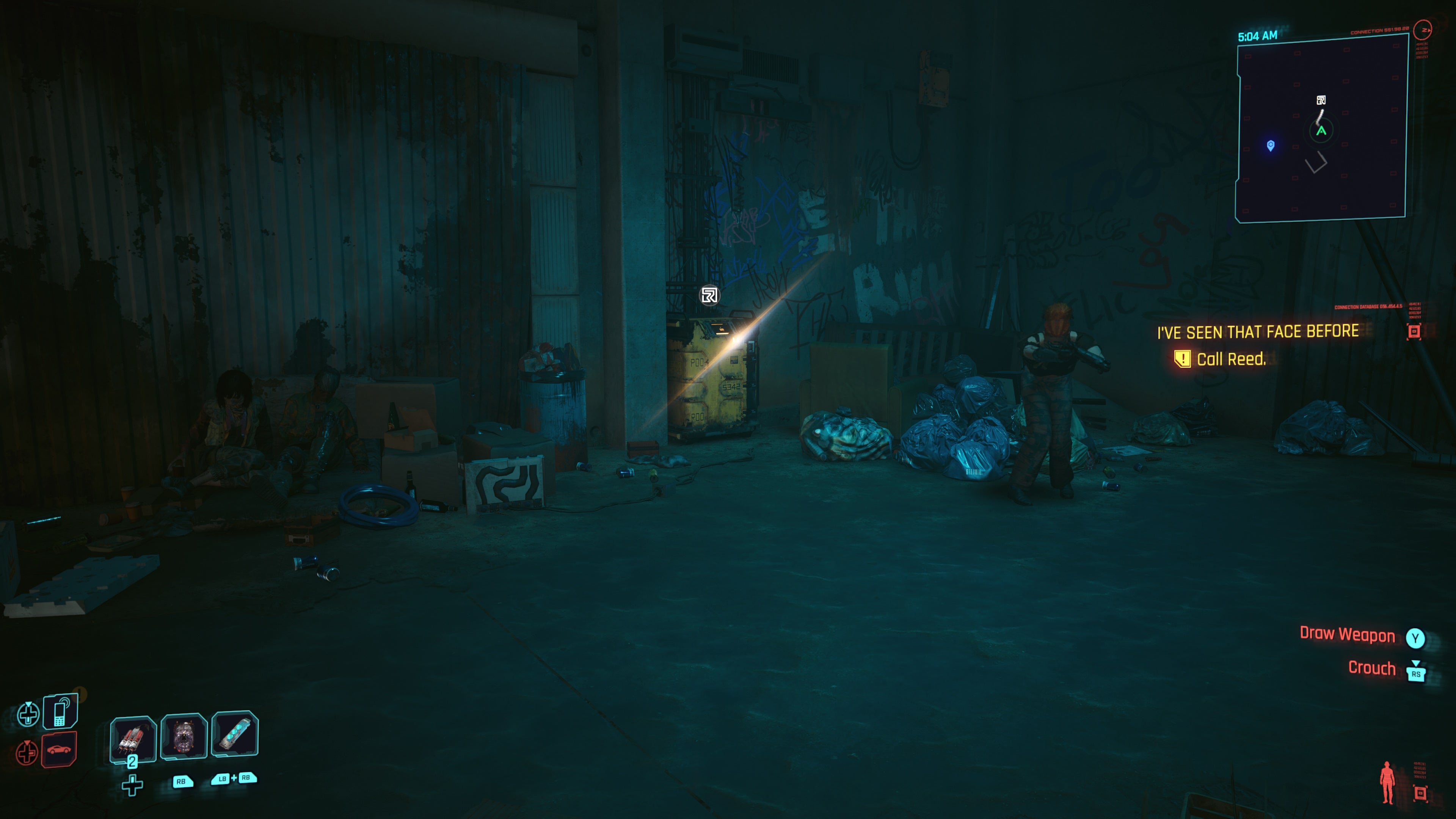 first person view of a yellow restricted data terminal under a building