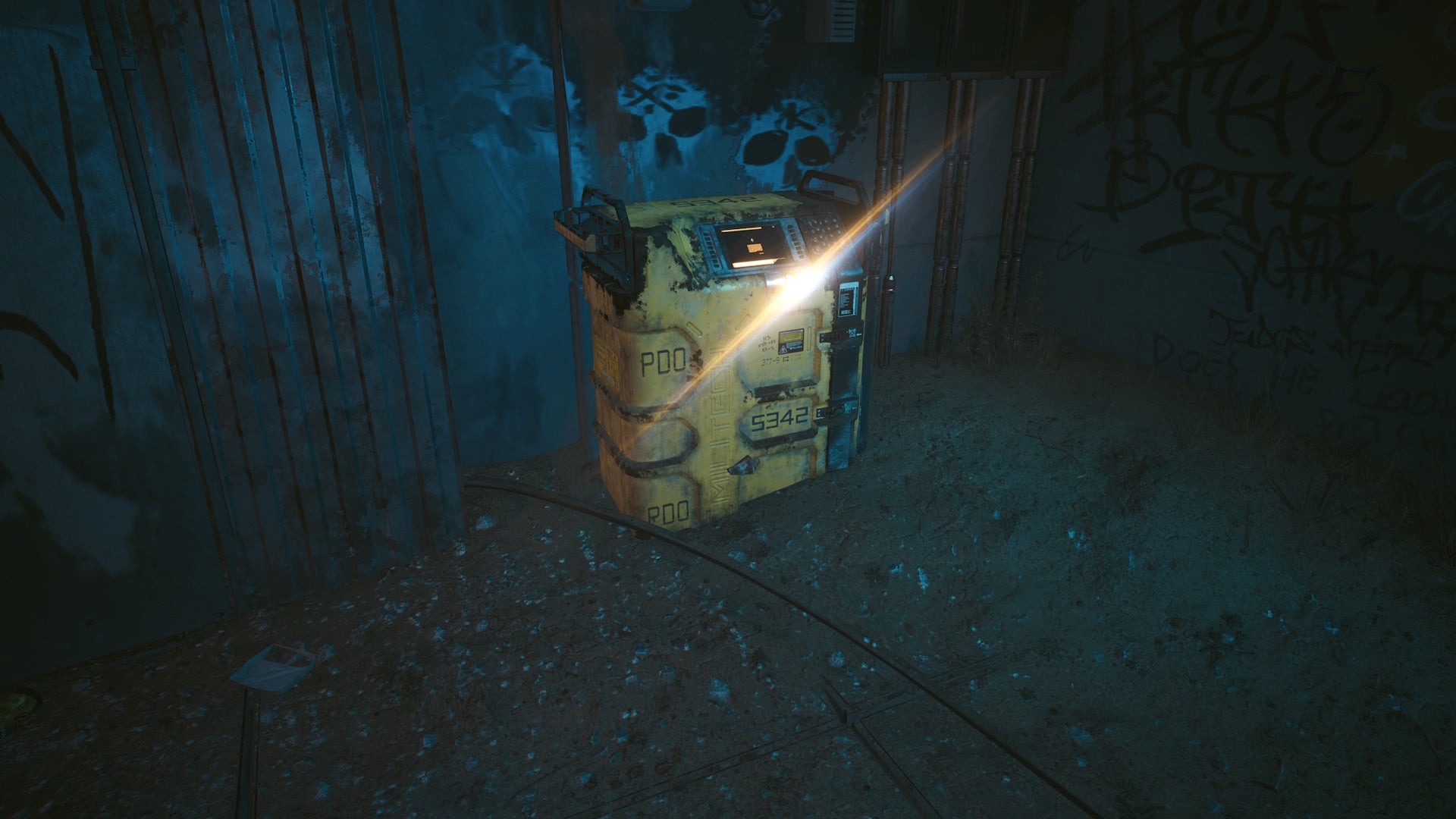 photo mode image of a yellow restricted data terminal and a small gleam coming from it
