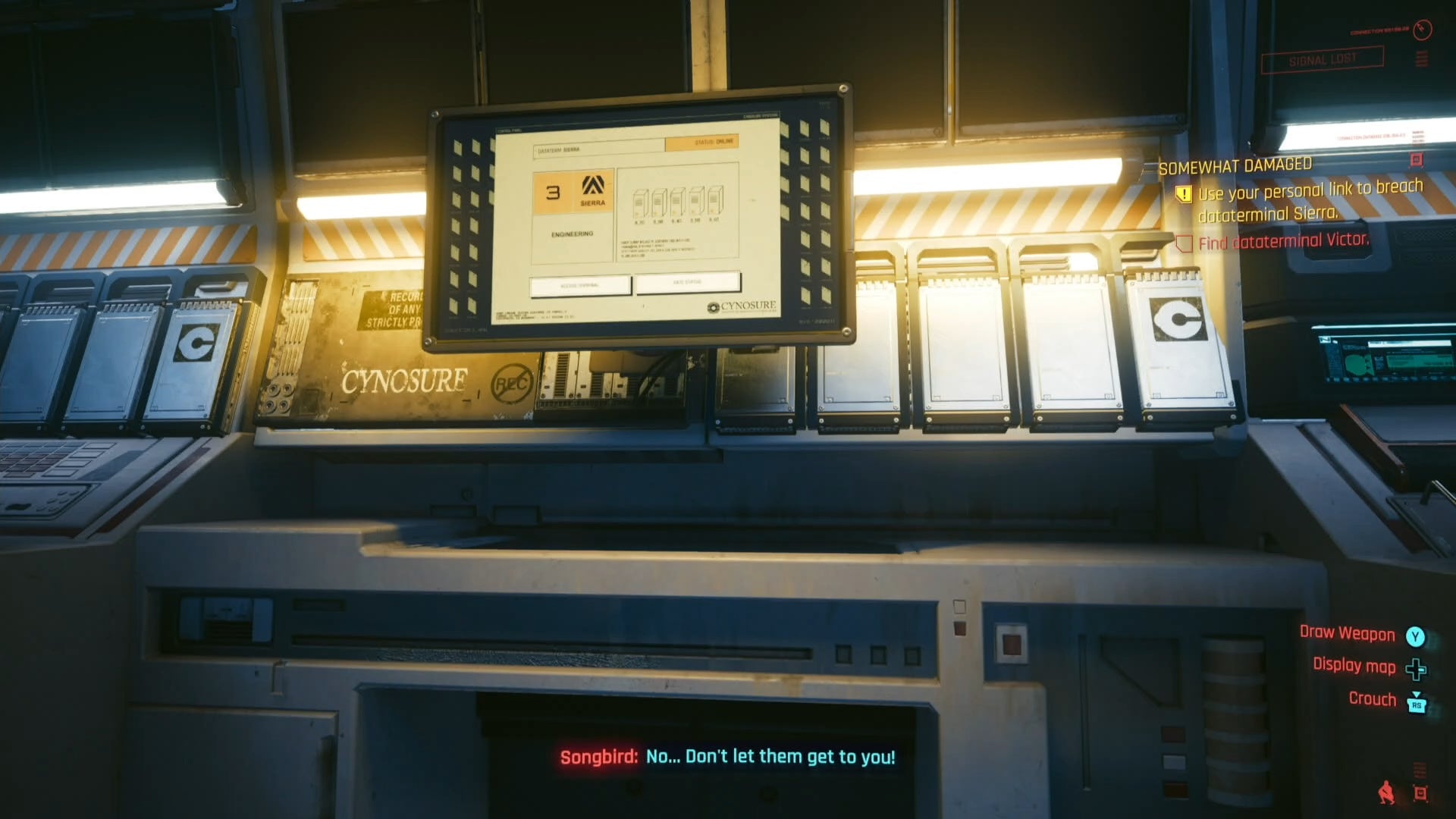 looking at a computer sceen with a yellow glow behind it