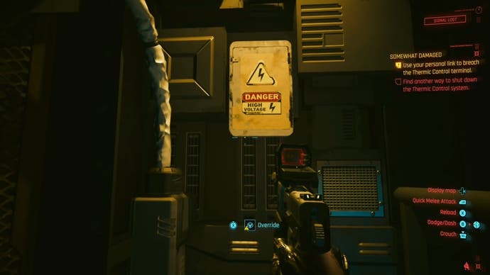 a yellow fuse box with a danger sign on it