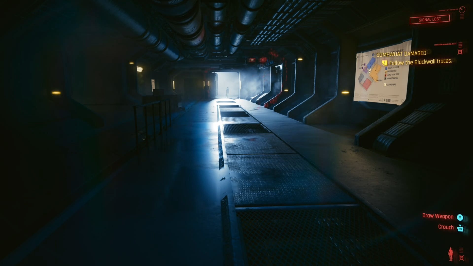 looking at Songbird at the end of a large corridor, who is bathed in white light