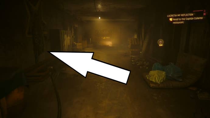 arrow pointing to the king of pentacles tarot graffiti in an apartment hallway