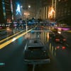 A nighttime driving scene in Cyberpunk 2077: Phantom Liberty, with DLSS 3.5 Ray Reconstruction switched on.