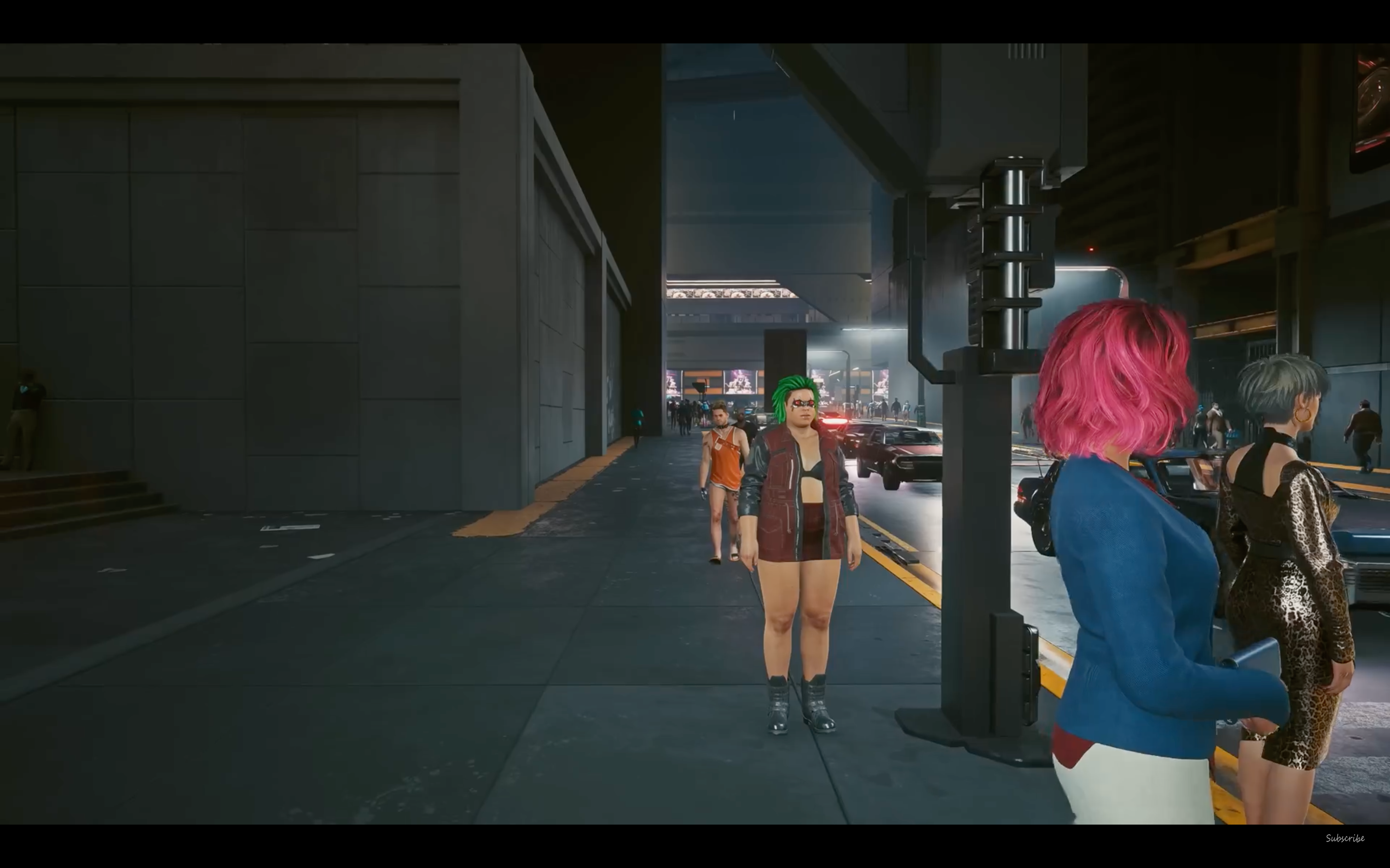 A street full of NPCs wearing colourful clothes in Cyberpunk 2077