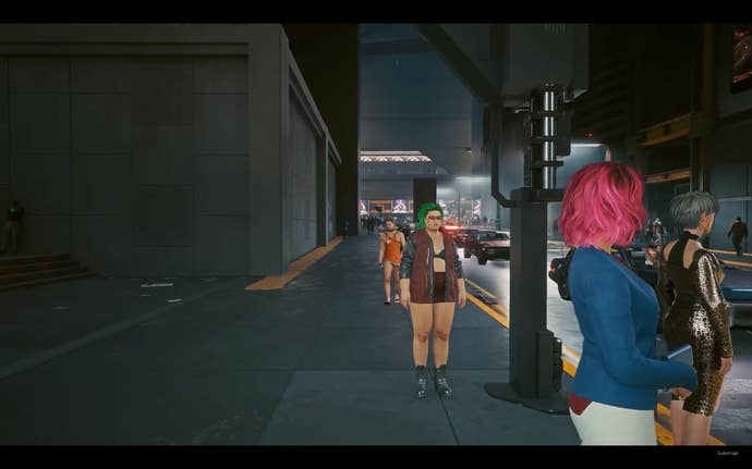 A street full of NPCs wearing colourful clothes in Cyberpunk 2077