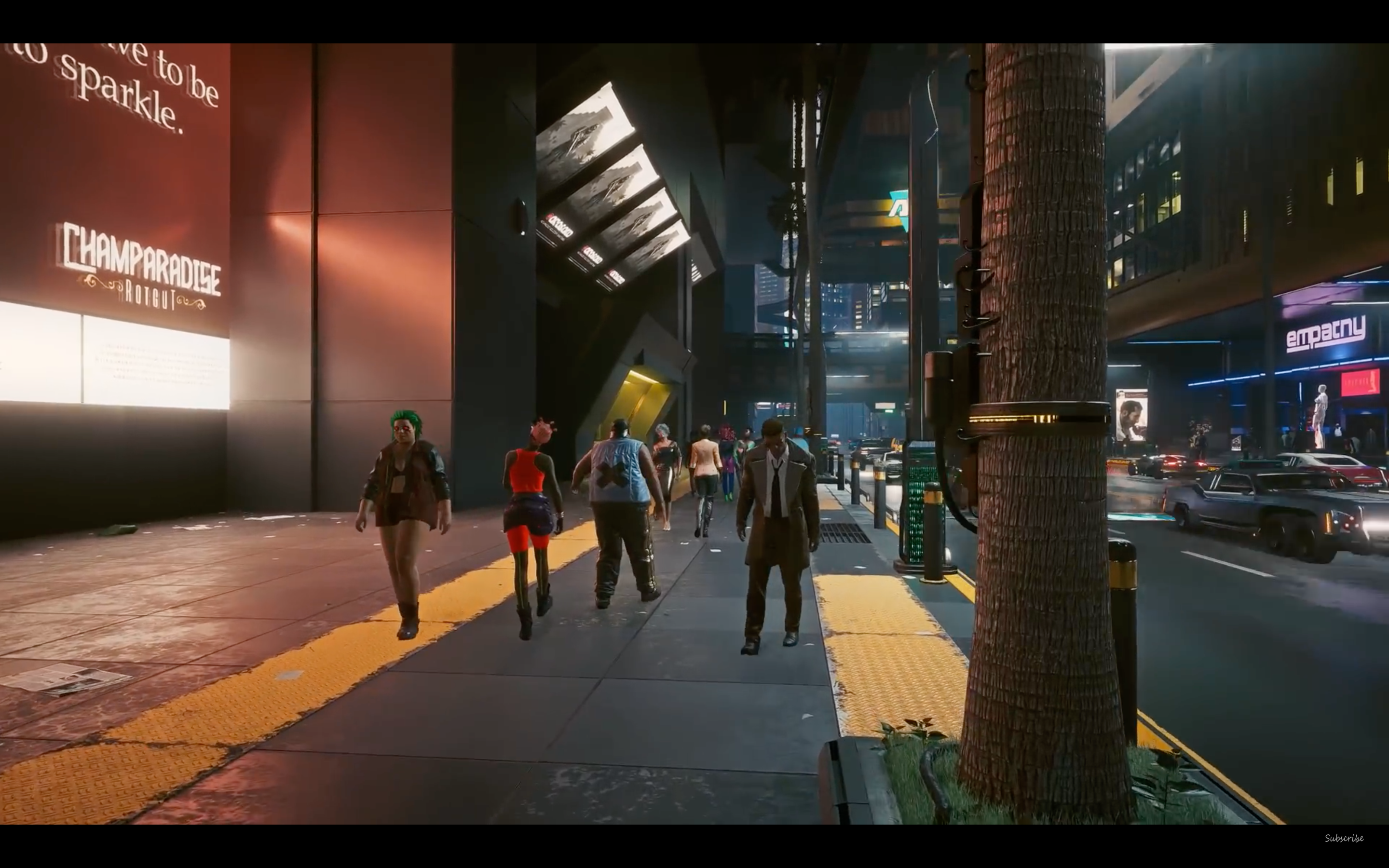 A busy street full of NPCs in Cyberpunk 2077